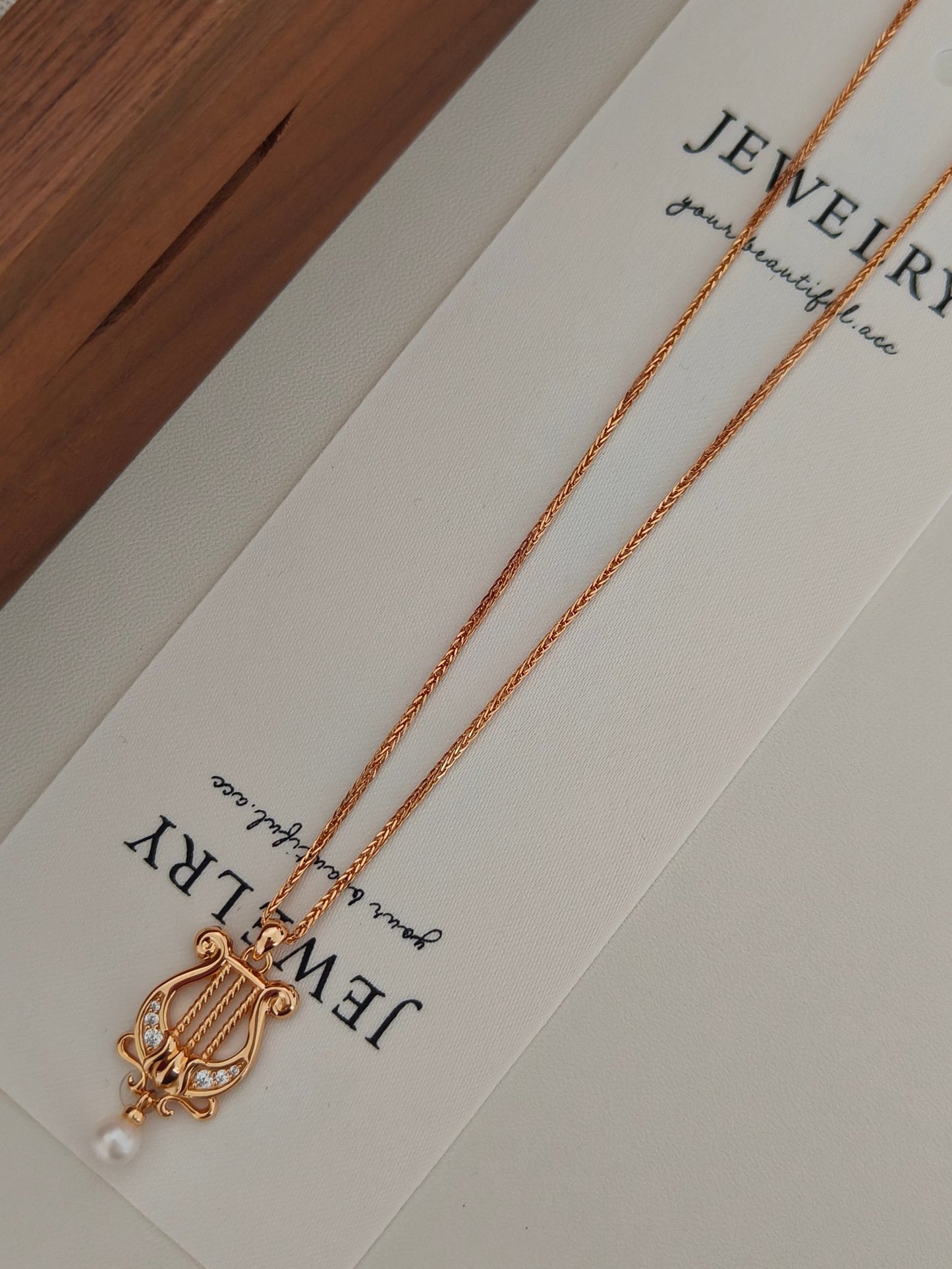 “Lyra Dreams”S925 sterling silver plated with 18k gold necklace and earrings