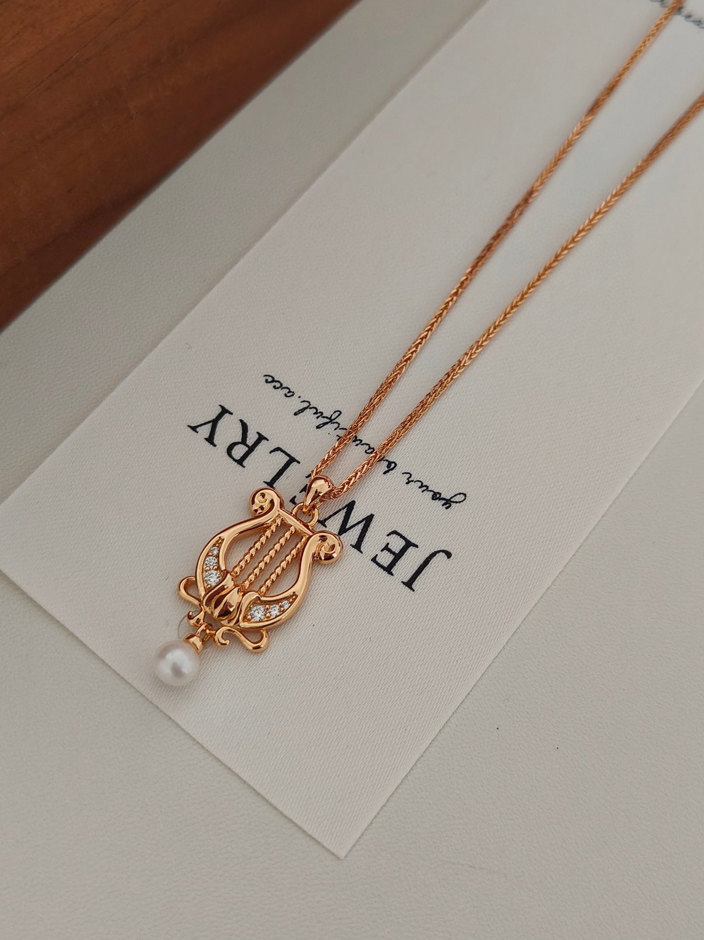 “Lyra Dreams”S925 sterling silver plated with 18k gold necklace and earrings