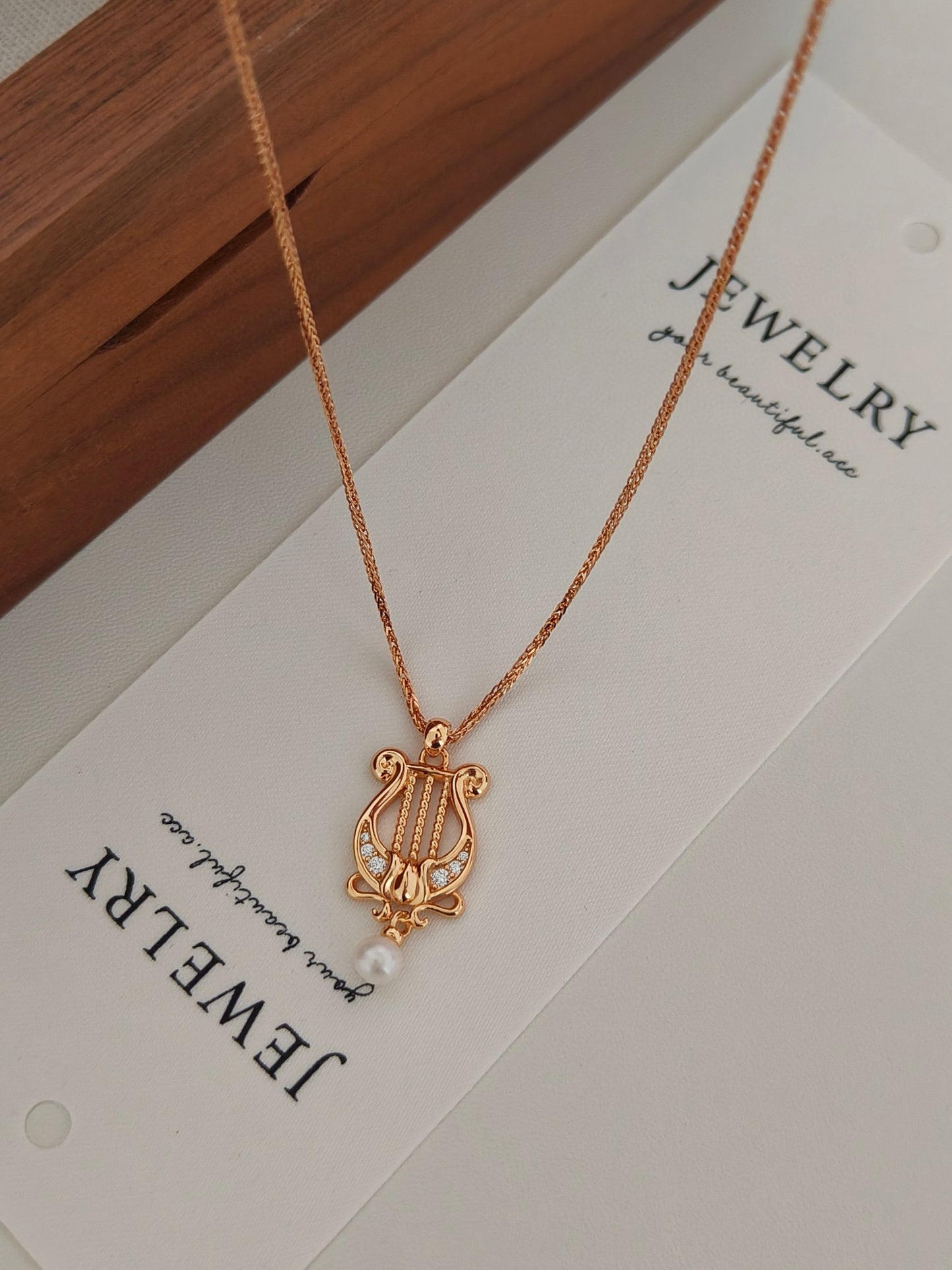 “Lyra Dreams”S925 sterling silver plated with 18k gold necklace and earrings