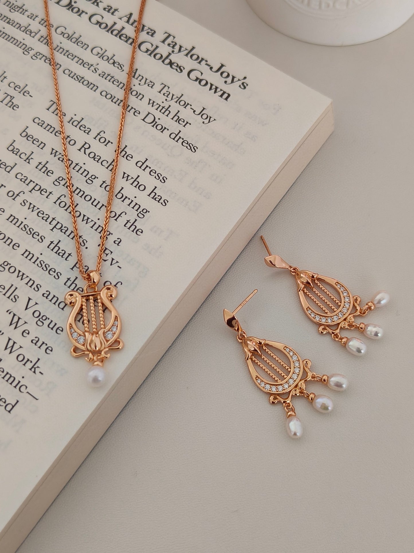 “Lyra Dreams”S925 sterling silver plated with 18k gold necklace and earrings