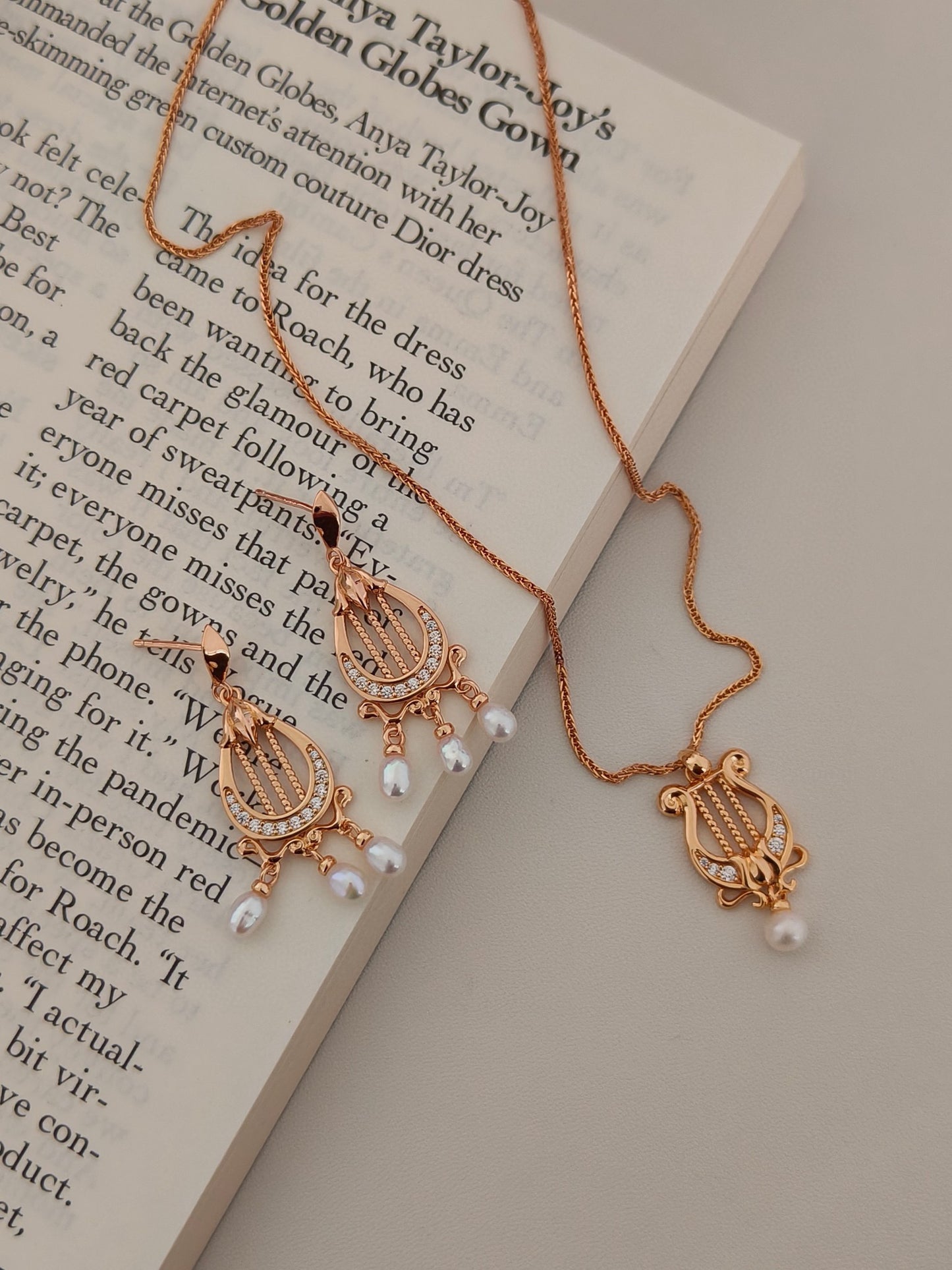 “Lyra Dreams”S925 sterling silver plated with 18k gold necklace and earrings