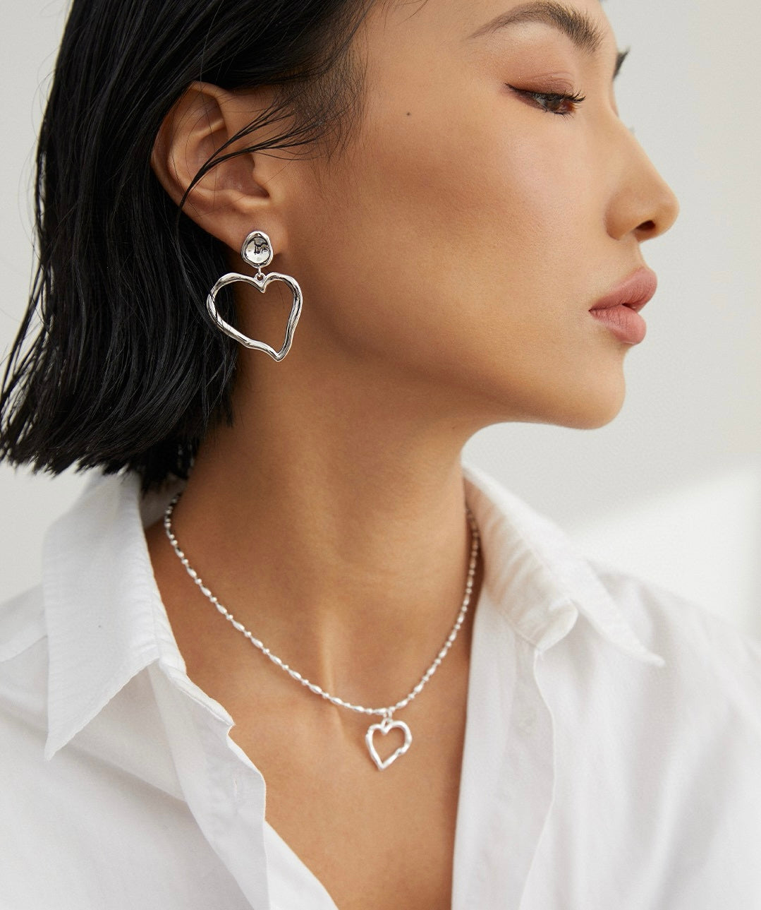 Twist of Heart Earrings and necklace