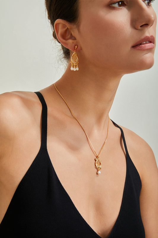 “Lyra Dreams”S925 sterling silver plated with 18k gold necklace and earrings