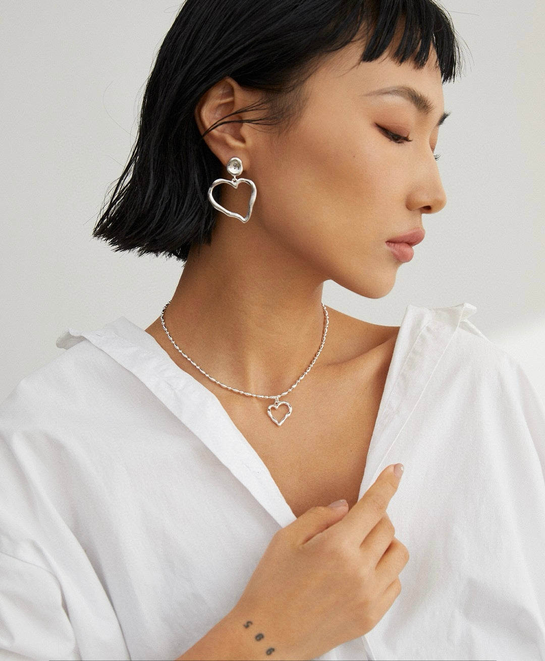 Twist of Heart Earrings and necklace