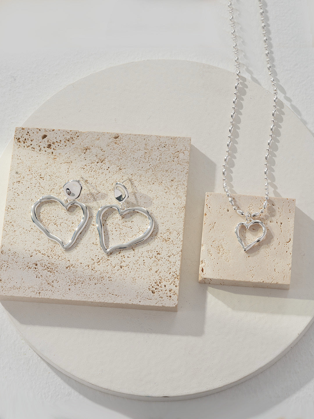 Twist of Heart Earrings and necklace