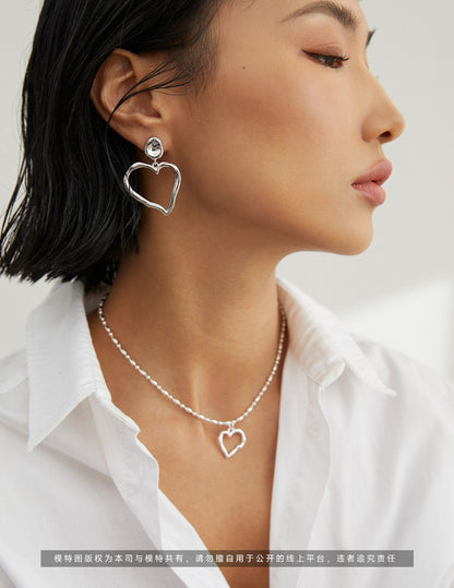 Twist of Heart Earrings and necklace